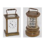 Timepiece with flicking chapters in cylindrical glazed brass case, early 20th century,