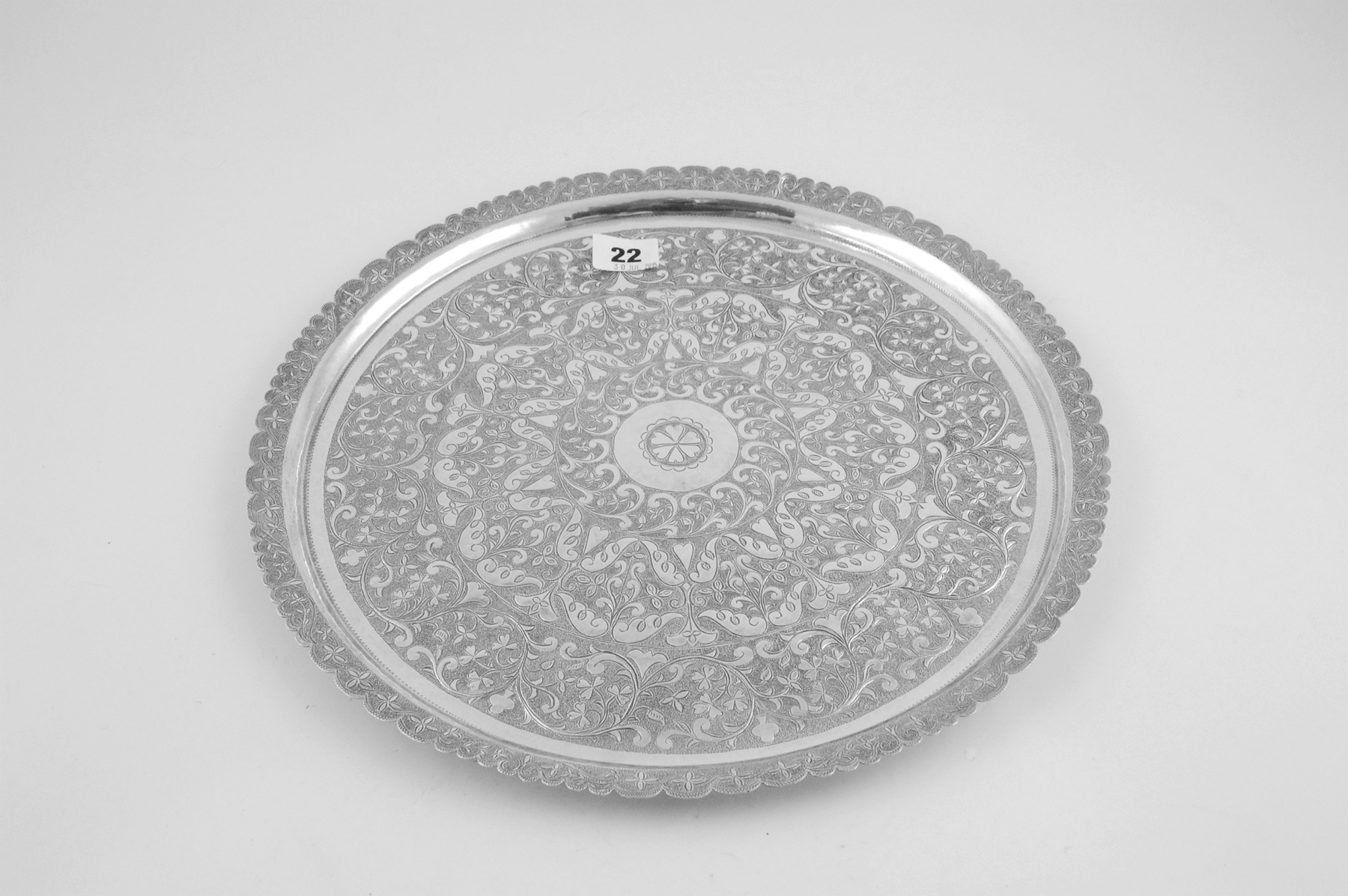 Indian silver circular tray with typical chased decoration, 13½", 18 oz.