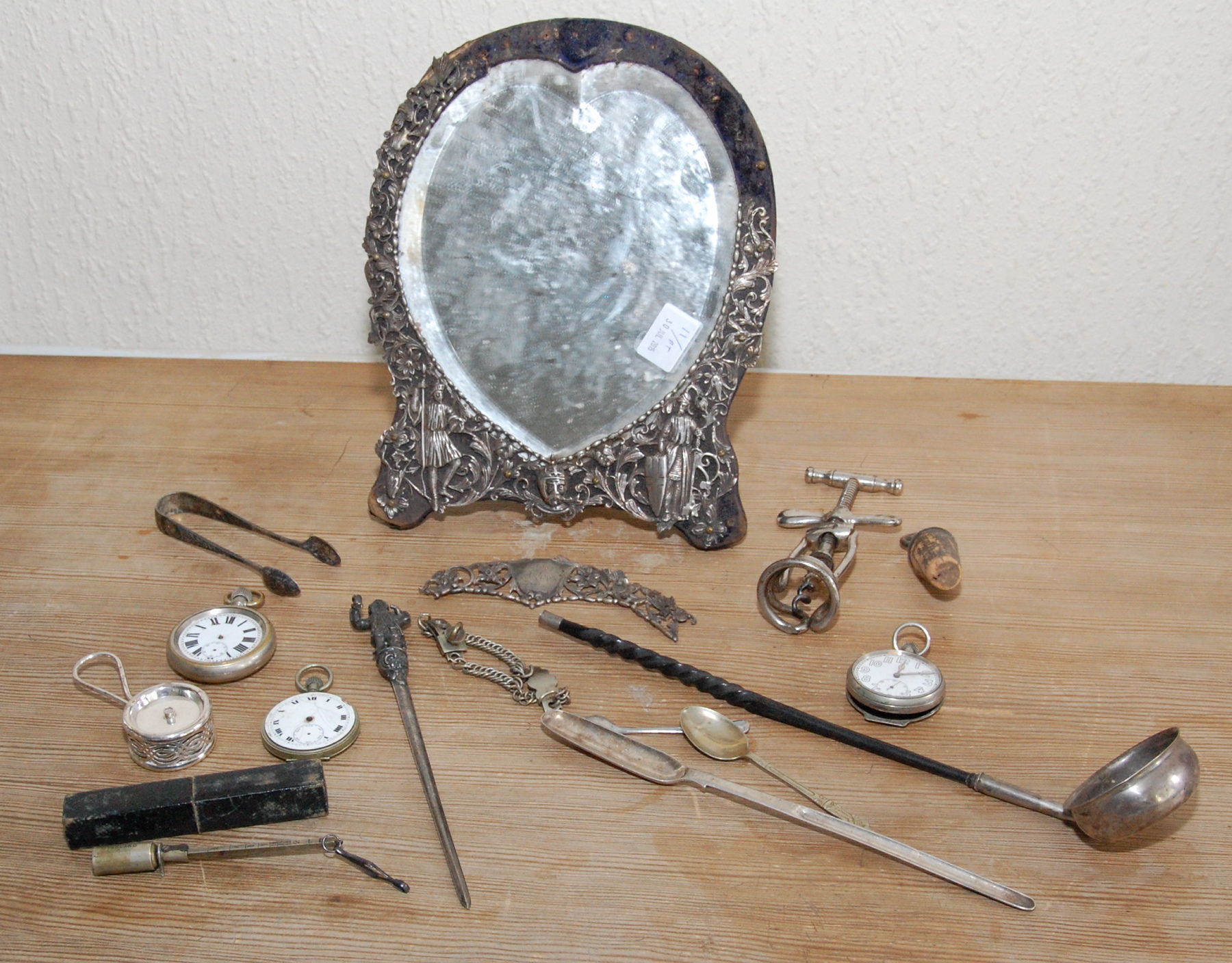 Toilet mirror of heart shape with pierced & embossed part mount, apparently unmarked, c.