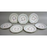 Set of 7 Minton Hand Painted Plates Floral center & beaded gilt & blue border. With  wall hanging