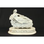 19th c. Parian figure, reclining Cleopatra Mounted on wood base. Approx. 17" x 17". (4050)  Old