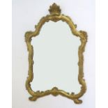 Venetian gilt wood mirror Early 20th century. Approx. 57 1/4" H x 37" W.  Gilding flaking Gilding
