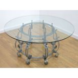 Baroque Style Wrought Iron Coffee Table Approx. 19 1/2" H x 42" W. Good condition. Good condition.