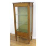 French Louis XVI style parquetry inlaid vitrine In satinwood and olivewood. With bronze swag