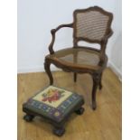 Lot of footstool and chair Needlepoint ball and claw footstool & Italian  caneback walnut chair.