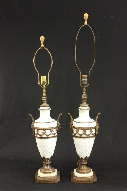 Pair of Bisque Lamps with Brass Mounts Approx. 19 1/2" H Line in one. Line in one.