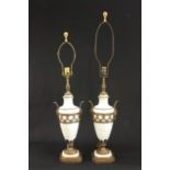 Pair of Bisque Lamps with Brass Mounts Approx. 19 1/2" H Line in one. Line in one.