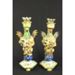 Pair of Figural Majolica Candlesticks Italian crowned, winged griffins with shields,  standing on