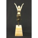 Art Deco Bronze & Bone Dancer on Onyx Base With bone features. Unsigned. Approx. 14 1/2" H.