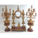 Gilt bronze & rouge marble clock set French Empire style. 19th century. Clock approx.  30" H, 18" W.