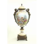 Late 19th/Early 20th C. Sevres Vase With figural ormolu mounts. Signed inside cover.  Artist signed.