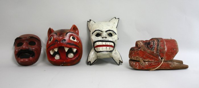 4 polychrome wood carnival masks The largest approx.10" H. (4050) Paint chipped and  worn Paint