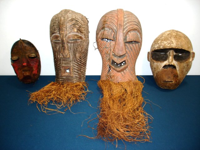 4 large carved African tribal masks Some from Lubin Galleries. Largest approx. 18" H.  (4050)