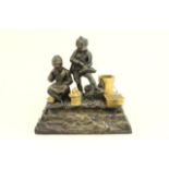 Bronze Figural Inkwell Depiction of boy and girl with Dore bronze.  Approx. 8 1/2" H x 9 1/2" W x