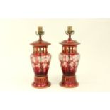 Pair of Cranberry Cut to Clear Glass lamps Approx. 16 1/2" high.