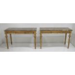 Pair of Marble Top Carves Console Tables circa mid 20th century. With gold leaf. Heavily  carved,