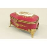 French Brass Mounted Porcelain Jewelry Box Gilt decoration. Approx. 4 1/2" H x 8" W x 4 1/2"  D.