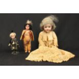 German Bisque Head Doll & 2 Smaller Dolls Stamped "JKC". Largest approx. 12" H. From a NYC