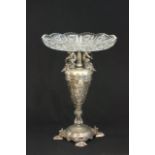 Figural Silver Plate & Glass Compote Decorated with cherubs, satyr faces, & lion feet.  Approx. 16