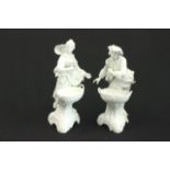 Pair of KPM White Porcelain Figures Man and woman with baskets. Approx. 8 1/2" H.  Fingers missing