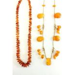 Two amber necklaces Various sizes.
