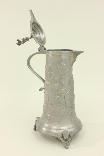 Pewter Figural Flagon Angel feet. Figure on top. Floral design. Approx  15" H. - Image 4 of 6