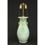 Chinese Porcelain Lamp Green ground with flowers. Approx. 17 1/2" H.