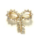 Fine 18k Gold & Diamond Bow Brooch Approx. 4.1 dwt. Clear stones. Clear stones.