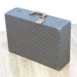 Louis Vuitton Hard Side Suitcase Approx. 16 1/4" H x 23 1/4" W. Small nicks to  leather, handle