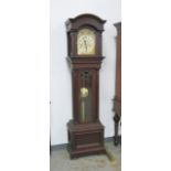 Mahogany Waterbury Grandfather's Clock With 2 weights, 3 key holes & pendulum. Approx.  79" H.
