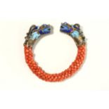 Coral, Brass & Enamel Chinese Bracelet Dragon ends.