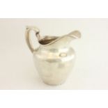 Sterling Silver Pitcher. Approx. 20.475 ozt. (4093) Ding on 1 side. Ding on 1 side.