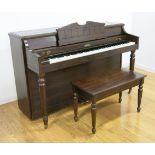 Baldwin Upright Piano with Bench Approx. 36" H x 57" W.