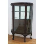 Mahogany Curved Glass Curio Cabinet With claw feet, glass shelves. Approx. 63 1/2"  high, 37 1/2"