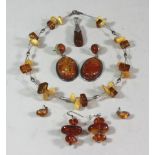 Sterling silver & amber jewelry Including, 3 pairs of earrings, pendant &  necklaces.
