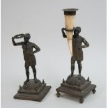Pair of bronze figures of Orientalist men Originally candleholders. One still retains bone
