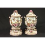 Pair of German Cash Pots Handpainted floral design. 19th Century. Approx.  12" H. 1 cover broken.