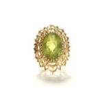 14k gold Ladies ring with green stone Filigree design. Approx. 6.4 dwt. (4071)