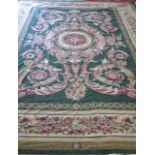 Aubusson Carpet Green field, floral design & center medallion.  Approx. 163" H x 117" W.