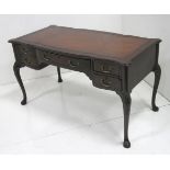 19th C English leather top desk with carved knees Approx. 29" H x 51" W x 25 1/2" D.