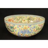 Chinese Eggshell Porcelain Bowl Yellow ground with dragon motif. Approx. 9 3/4" D  x 4 1/4" H.