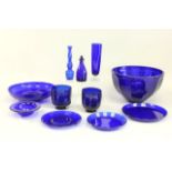 Lot of Blue Glass Including a punch bowl, 12 tall glasses, bowl, 7  dishes, 12 plates, 6 bowls, 6