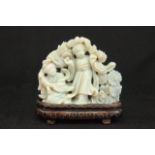 Chinese Carved Opal on Inlaid Wood Stand 2 figures & flowers. Approx. 3" H x 3" W.