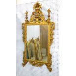 French gold leaf wood mirror Approx. 53" x 29 1/2". Some gold loss on bottom. Some gold loss on