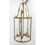 Brass & Glass Cylinder Lantern Chandelier Approx. 35" high by 16" in diameter.
