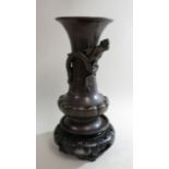 Japanese Bronze Figural Vase on Teak Wood Stand With dragon vase. Approx. 12" H.