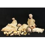 Four Antique Bisque Head Dolls