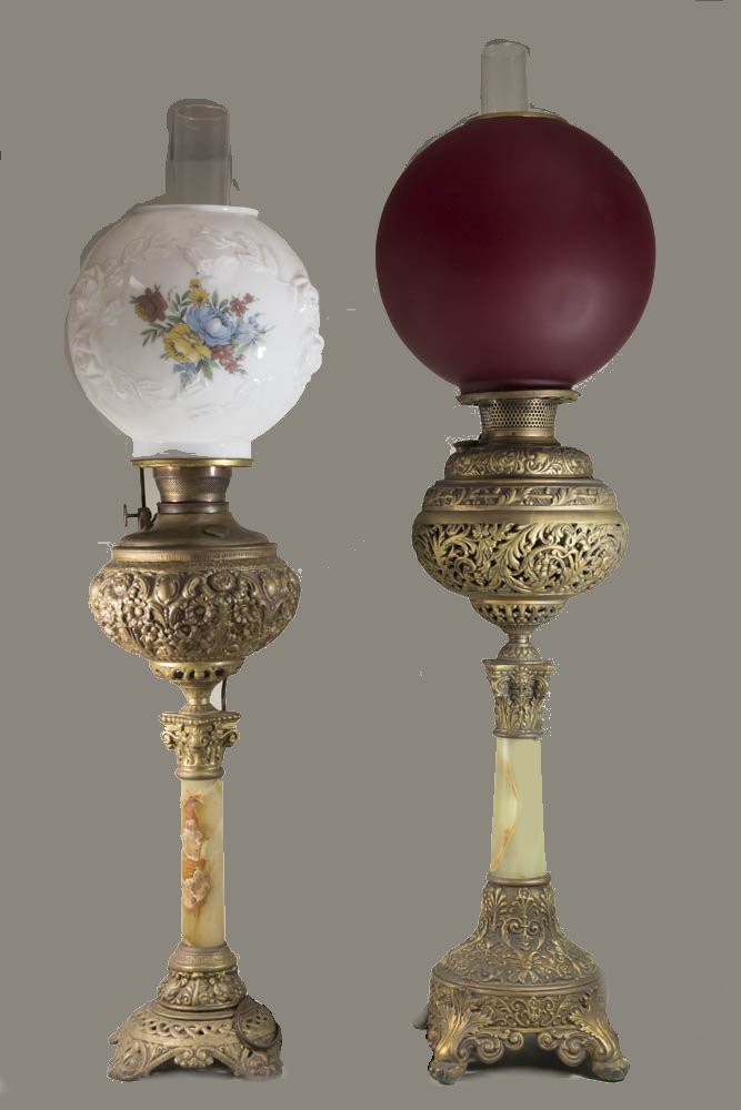 2 Banquet Lamps Gilt metal and onyx with ruby red shade, approx.  33" H. Bradley & Hubbard gilt