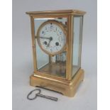 Tiffany & Co. French Bronze Clock With beveled glass. Approx. 9" H x 6" W x 5" D.  Patina worn on