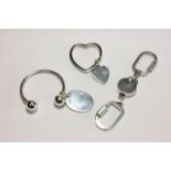 2 Tiffany Sterling Silver Keychains In pouch and original box (1 pouch and box).  Tiffany heart